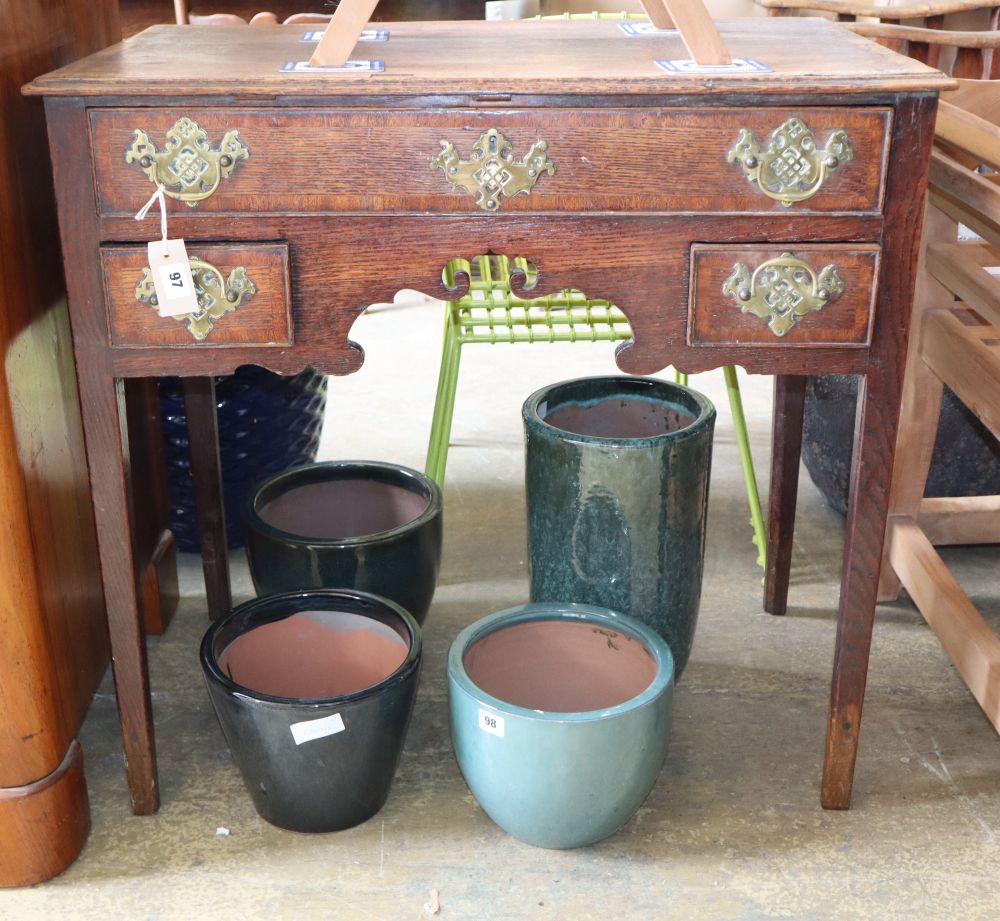 A George III cross banded oak lowboy, W.80cm, D.46cm, H.79cm